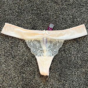 Adore Me light pink thong, brand new w/ tags attached, size Medium.